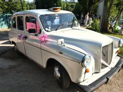 Louer une AUSTIN TAXI Anglais de 1990 (Photo 0)