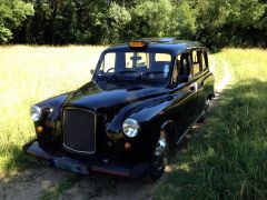 CARBODIES Taxi Anglais (Photo 1)