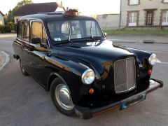 Louer une CARBODIES Taxi Anglais de de 1990 (Photo 1)