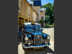 Louer une CARBODIES Taxi Anglais de 1990 (Photo 0)