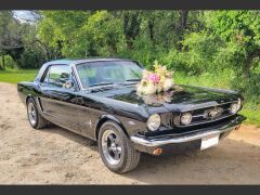 Louer une FORD Mustang de 1965 (Photo 1)