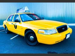 Louer une FORD Taxi New-yorkais Crown Victoria  de 2010 (Photo 1)