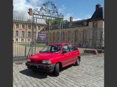 Louer une KIA Pride de de 1990 (Photo 1)