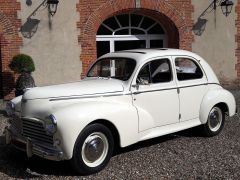 Louer une PEUGEOT 203 C de de 1958 (Photo 2)