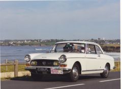 Louer une PEUGEOT 404 Coupé de 1967 (Photo 2)