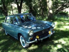 Louer une PEUGEOT 404 SL de 1967 (Photo 0)