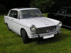 Louer une PEUGEOT 404 de 1966 (Photo 0)