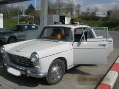 Louer une PEUGEOT 404 de de 1966 (Photo 2)