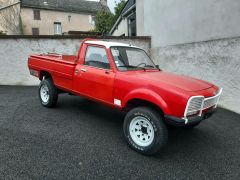 Louer une PEUGEOT 504 Pick Up Dangel de de 1987 (Photo 1)