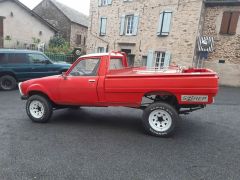 Louer une PEUGEOT 504 Pick Up Dangel de de 1987 (Photo 4)