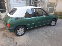 Louer une PEUGEOT Roland Garros de de 1989 (Photo 5)