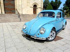 Louer une VOLKSWAGEN Coccinelle de luxe de de 1957 (Photo 1)